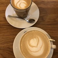 Cafe latte and white flat with almond milk   at SmetanaQ Cafe & Bistro in Prague