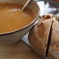 Zwarte linzen soep, met broodje en vegan boter at De 4 Jaargetijden  in Epen