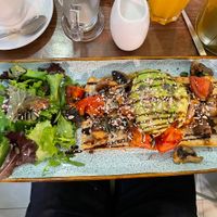 Vegan toast - mushrooms, tomatoes and avocado on toast   at Mil Sabores in Lisbon
