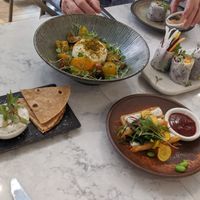 Small plates (summer rolls, flatbread, buffalo mozarella and something I can't remember) at Holy Carrot in London