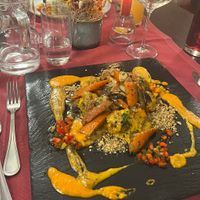 Vegan pumpkin seed gnocchi with caramelized vegetables, organic mushrooms, 2 kinds of root vegetable sauce and peanuts  at Haider in Pollau