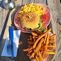 Smoked Tofu Burger, fries and sweet potato fries at Moni's Eck in Techendorf