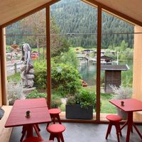 Inside seating area with a beautiful view on the lake.  at Moni's Eck in Techendorf
