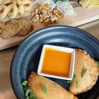 They make their own cashew cheese, OMG! Also, tempeh black bean empanada (gf) at The Cellar in Corning