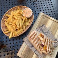Fries and the tasteless vegan burrito  at Ezitis Migla - Grēcinieku iela in Riga