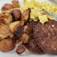 Vegan sausage, vegan eggs, vegan potatoes at Donut Villa Diner in Malden