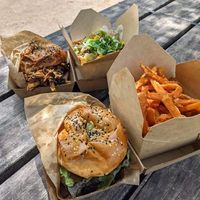 Plant pulled burger (back), American burger, loaded fries, and sweet potato fries  at World Food Trip in Zweibruecken