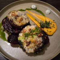 Main course: portobello mushroom with vegan cheese and cashews, sweet potatoe and cooked wheat at Gistihúsið in Egilsstadjir
