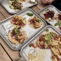 Nachos, tofish taco, al pastor taco, bbq rib taco, cheeseburger taco, chips at Club Mexicana - Soho in London