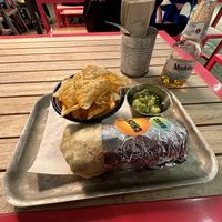 Crispy Chicken Burrito, tortilla chips & guac, Modello beer  at Club Mexicana - Soho in London