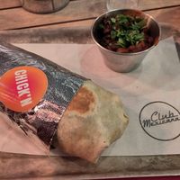 Chicken burrito wrap and refried beans at Club Mexicana - Soho in London