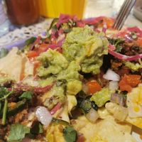 Fully loaded nachos were great. at Club Mexicana - Soho in London
