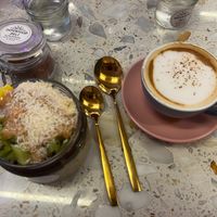 Granola bowl and cappuccino at Superfood Deli - Maria Theresien in Vienna