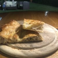 Tutto accompagnato da una focaccia speciale  at Focacceria da Francesco in Sarzana