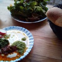 Kale with harissa and something I can't recall. Loved them both. Fluffy bread too. at Cafe Pilz in Berlin