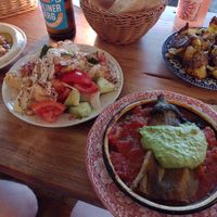 Hummus, brotsalat, hot aubergine and potatoes at Cafe Pilz in Berlin