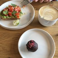 Delicious avocado toast, raw ball and oat based cappuccino 🤤 at Twenty Twenty Coffee in Hvide Sande