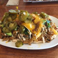 Loaded Shawommes with everything: fries, mushrooms, veganmeat, cheese, jalapeños, onions...what else do you need? Of course: hummus 😁💜 at Dominion Food Revolution in Frankfurt