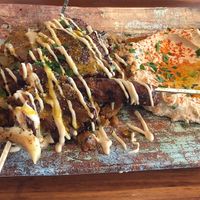 Dominion food mix: oyster mushrooms, hummus, meaty goodness, pita 💜 at Dominion Food Revolution in Frankfurt