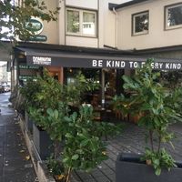 SIde entrance, plus outdoor seating. at Dominion Food Revolution in Frankfurt