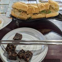 Partially eaten "pig blood cake" made with sticky rice 👍 +  Banh mi slightly adjusted by owner to make it vegan at Tiān Cí Bǎo Xuān 天慈寶軒 in Yuli