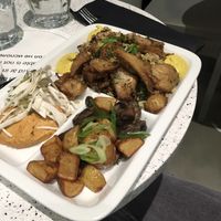 Vegan butcher meat with mixed cereals, potatoes and mushroom + zero waste dish (hummus and pickles) at Happy Farmer in Helsinki