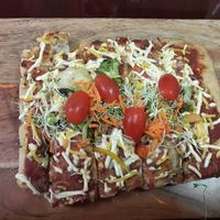 Delicious pizza! Bread was super light! at Madre Tierra in Caguas
