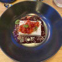 Coconut panna cotta with strawberry souce  at Restavracija Sunrose 7 in Bohinjska Bistrica