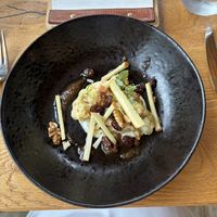 Cauliflower with walnuts, raisins, apple and walnut miso  at Restavracija Sunrose 7 in Bohinjska Bistrica