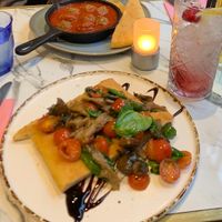 Starters of plant balls in sauce and a flatbread with veg  at Lucia in York
