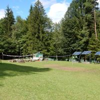 Rex's Bar, campfire and solar panels at ECO River Camp in Globoko