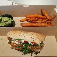 Hot doggy with fries and guacamole. at Two Monkeys  in Malmo