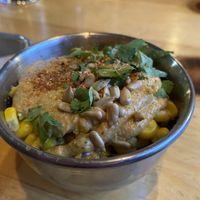Elote - corn in cup with cashew cream, sunflower seeds, cilantro, tajin   at Switchback in Durango