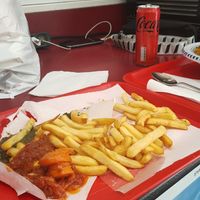 Chips with 4 different sauces at Maoz - Saint Andre des Arts in Paris