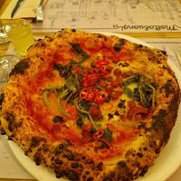 Tomato base pizza with vegan cheese, chilli, vegan ventricina and friarielli. at Molto Buono in Bristol