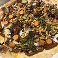 Added “meat”, greens, and eggplant    at 85 pizza in Milan