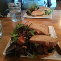 Vegan Tempeh BLT (front) and Vegetarian Roasted Apple and Brie Panini (back)  at Cafe Nola in Frederick