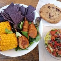 Grilled corn, guacamole and nachos, "chicken" wings, chocolate cookie at Copper Branch in Nancy