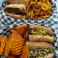 Philly cheese steak y fakc yeah. Camote fries y curly fries at fakc-yeah - Cloud kitchen in Mexico City