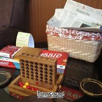 Games & papers for customers to use at FeelGoods Cafe in St James