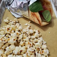 Chickpea wrap (minus feta) with side of popcorn at Grazery in Carlisle