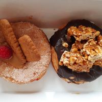 Sugar-coated with Lotus filling, chocolate with peanut butter & jam filling at Royal Donuts  in Mannheim