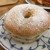 Sweet donut burger with black cherry jelly and cream at Hatena in Tokyo