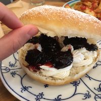 Sweet donut burger with black cherry jelly and cream at Hatena in Tokyo