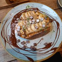 Peanut butter, banana, dark chocolate & chia seed topped toast (sourdough bread, but white & granary also available)...delicious 👌 at Drift-In in York