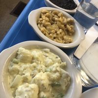 Sriracha beans, Mac and chee and potato salad!! at Earth Based Cafe in Martinsburg