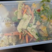 Mixed salads in plastic takeaway container at Crooked Kitchen in Bendigo