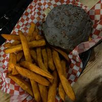 Black Bun Burger with sweet potato fries at Plant Base in Lisbon