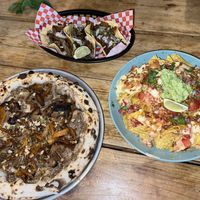 Tacos, nachos and mixed mushroom pizza  at Plant Base in Lisbon