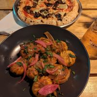 Plant base pizza and dumplings at Plant Base in Lisbon